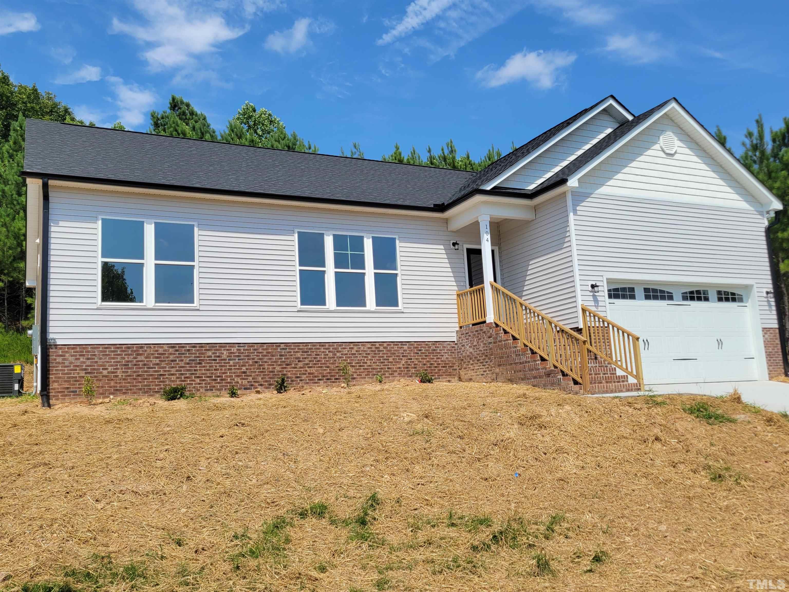 104 Glasgow Street Stem, NC 27581 - Photo 21 of 21 a front view of a house with a yard