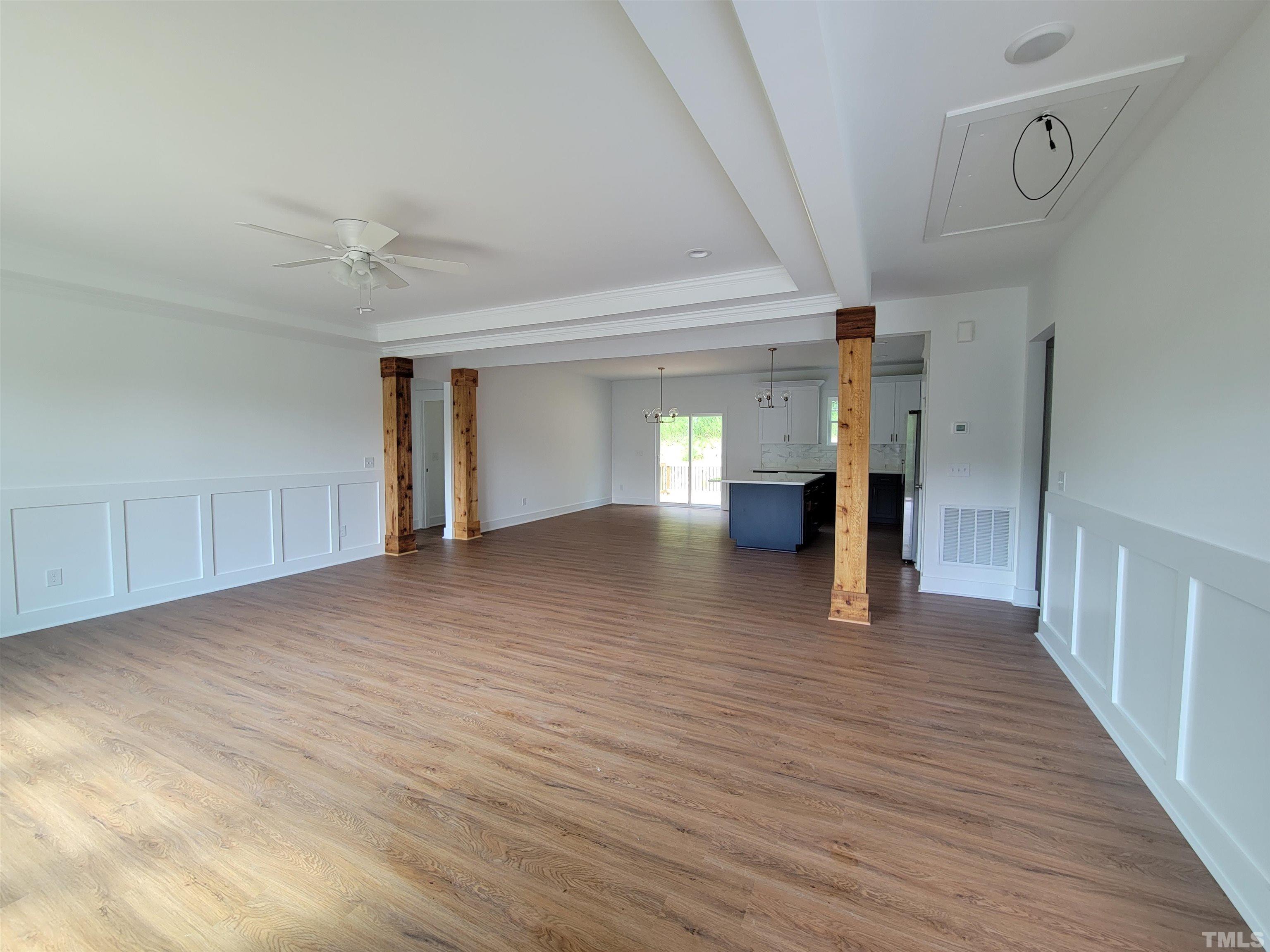 104 Glasgow Street Stem, NC 27581 - Photo 5 of 21 a view of empty room with wooden floor