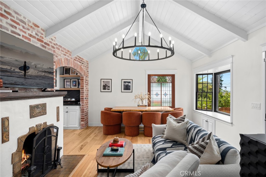 615 Seaview Street Laguna Beach, CA 92651 - Photo 33 of 33 The open floor plan highlights timeless details such as original stained-glass windows, custom doors, and intricate brickwork.