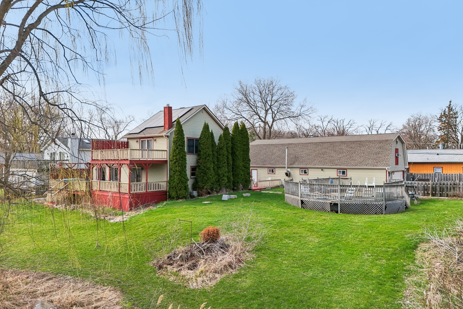 27884 West Riverside Drive Antioch, IL 60002 - Photo 1 of 45 a view of a house with a yard and sitting area