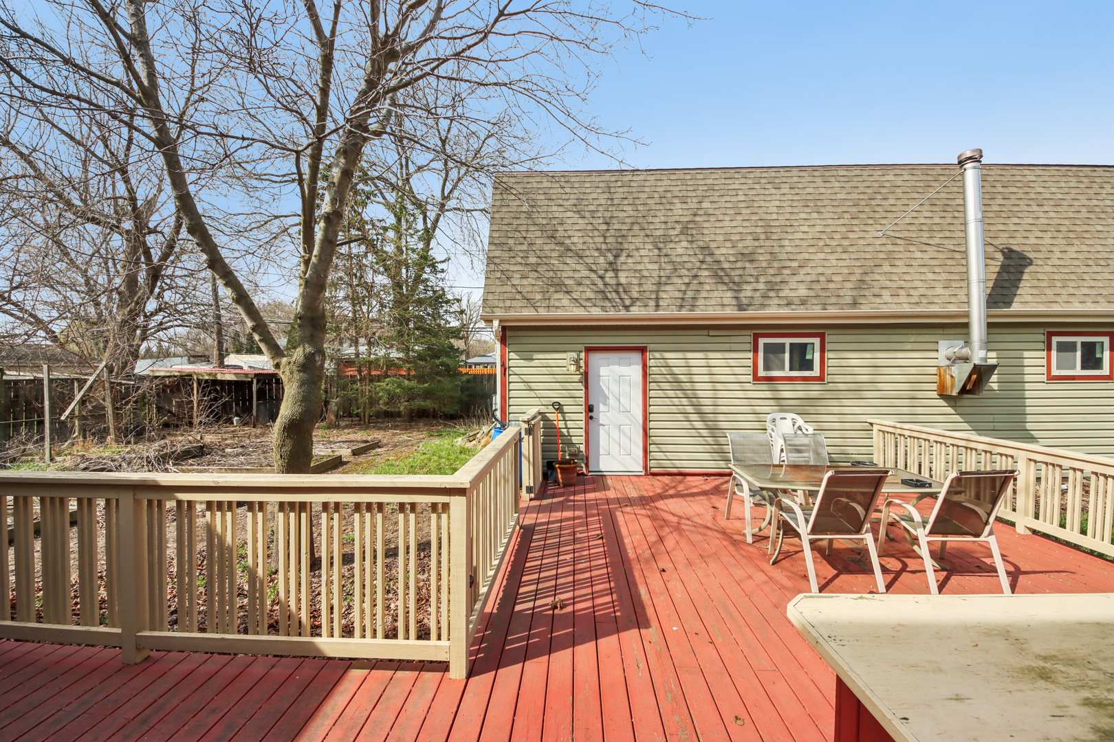 27884 West Riverside Drive Antioch, IL 60002 - Photo 27 of 45 a view of a roof deck with wooden floor and fence