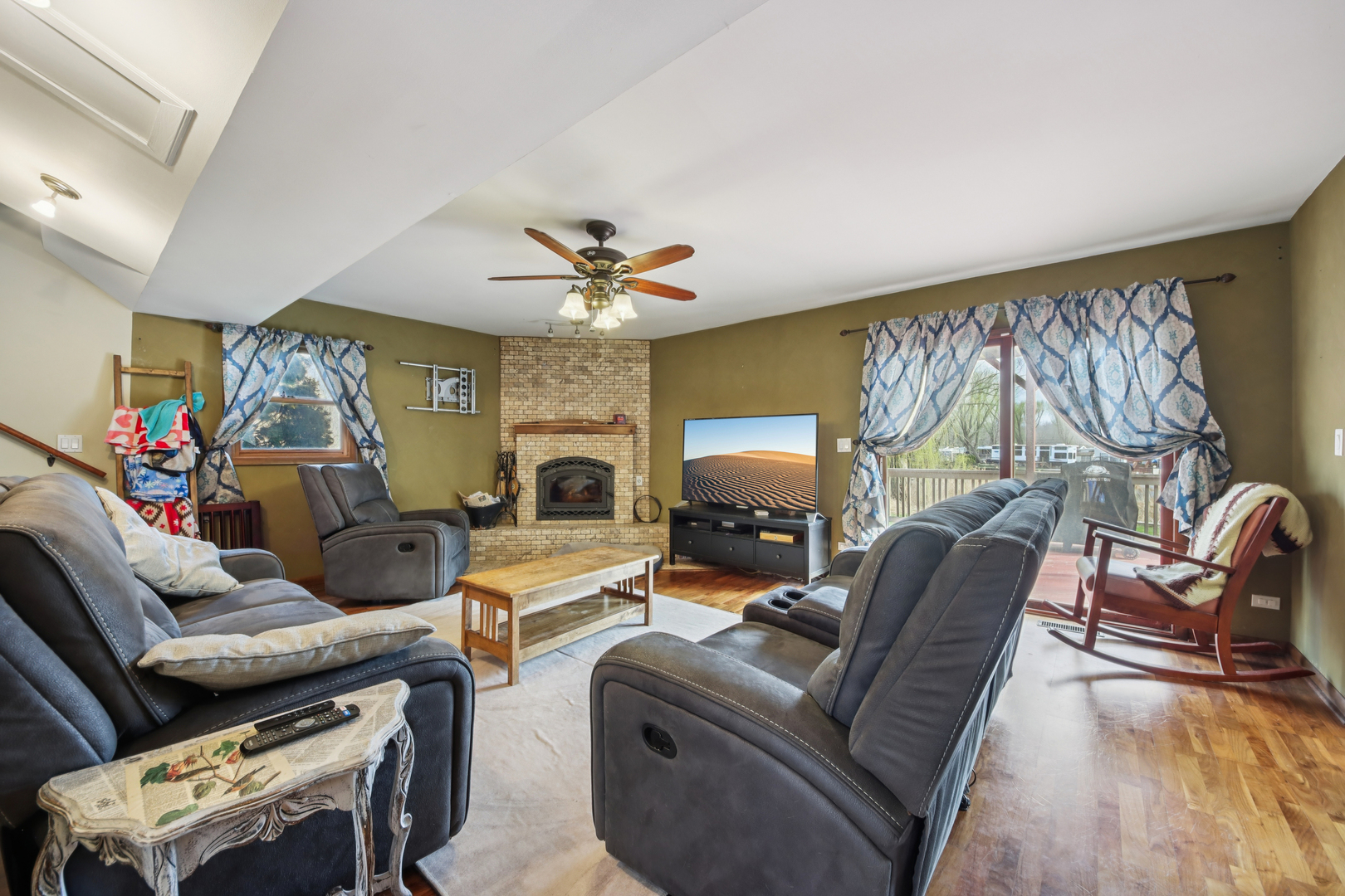 27884 West Riverside Drive Antioch, IL 60002 - Photo 3 of 45 a living room with furniture and a chandelier