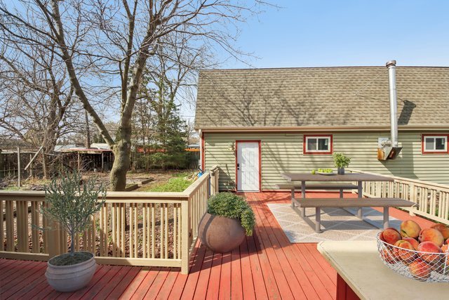 27884 West Riverside Drive Antioch, IL 60002 - Photo 41 of 45 a view of a patio with couches table and chairs and potted plants