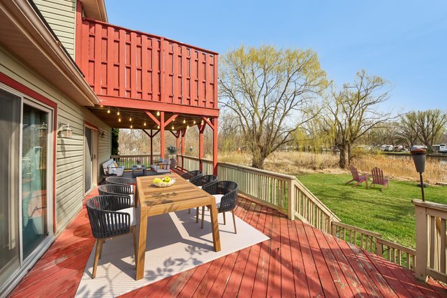 27884 West Riverside Drive Antioch, IL 60002 - Photo 43 of 45 a view of a chairs and table on the wooden floor