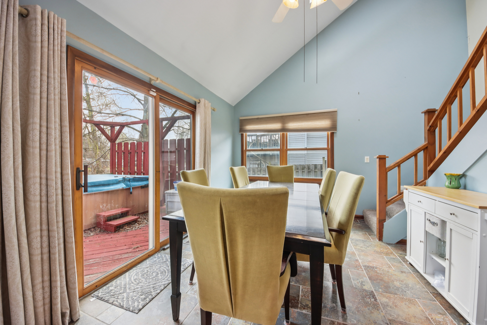 27884 West Riverside Drive Antioch, IL 60002 - Photo 9 of 45 a view of a dining room with furniture a chandelier and wooden floor