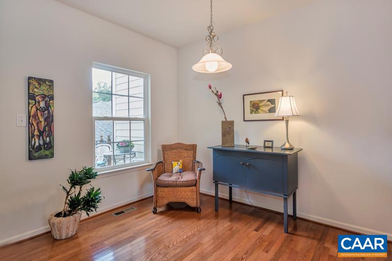 731 Rainier Road Charlottesville, VA 22903 - Photo 9 of 25 a living room with furniture and a potted plant