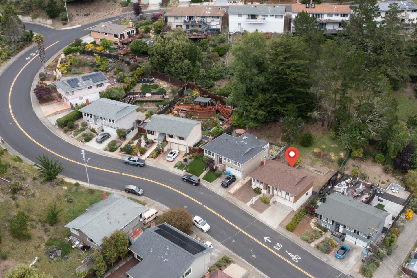 1287 Lerida Way Pacifica, CA 94044 - Photo 10 of 52 an aerial view of a house with a swimming pool