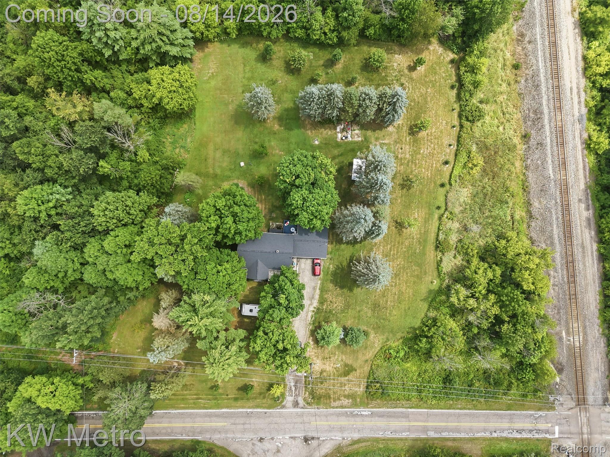 201 South Maple Leaf Road Lapeer, MI 48446 - Photo 60 of 70 Expansive property with a single-story residence, surrounded by mature trees and open green spaces