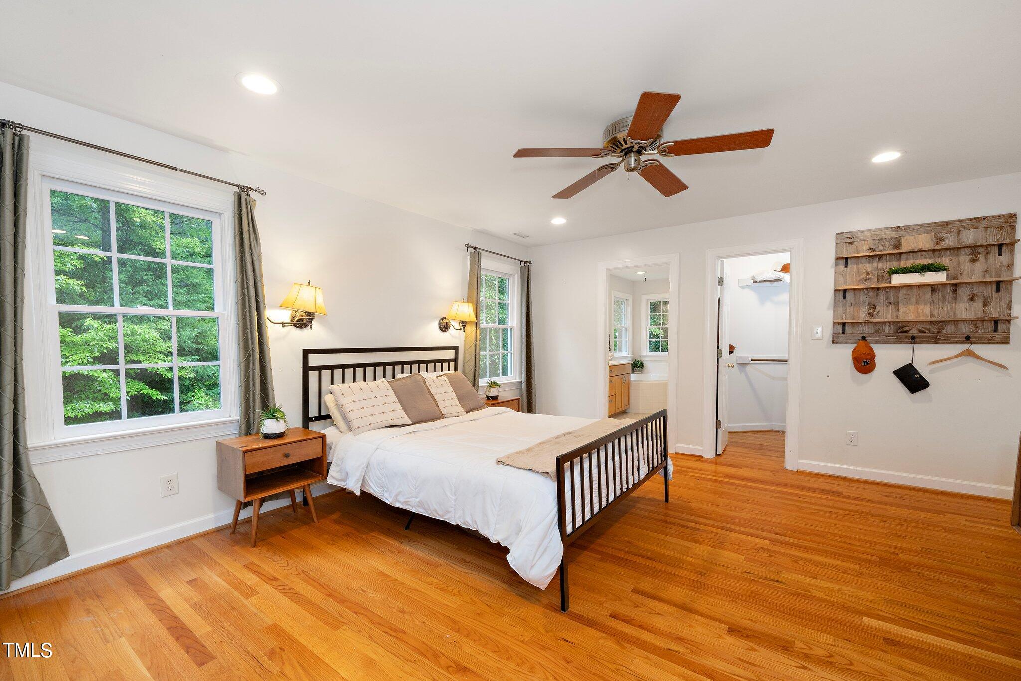 4427 Spring Meadows Road Hillsborough, NC 27278 - Photo 17 of 42 a bedroom with a bed and a window