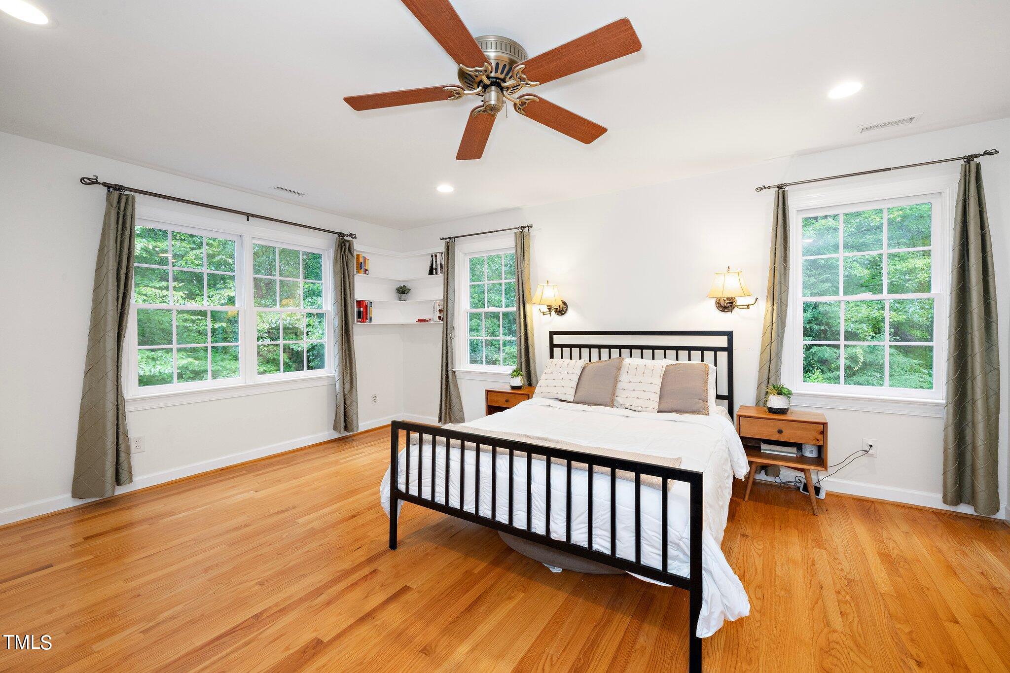 4427 Spring Meadows Road Hillsborough, NC 27278 - Photo 18 of 42 a bedroom with a bed and a window