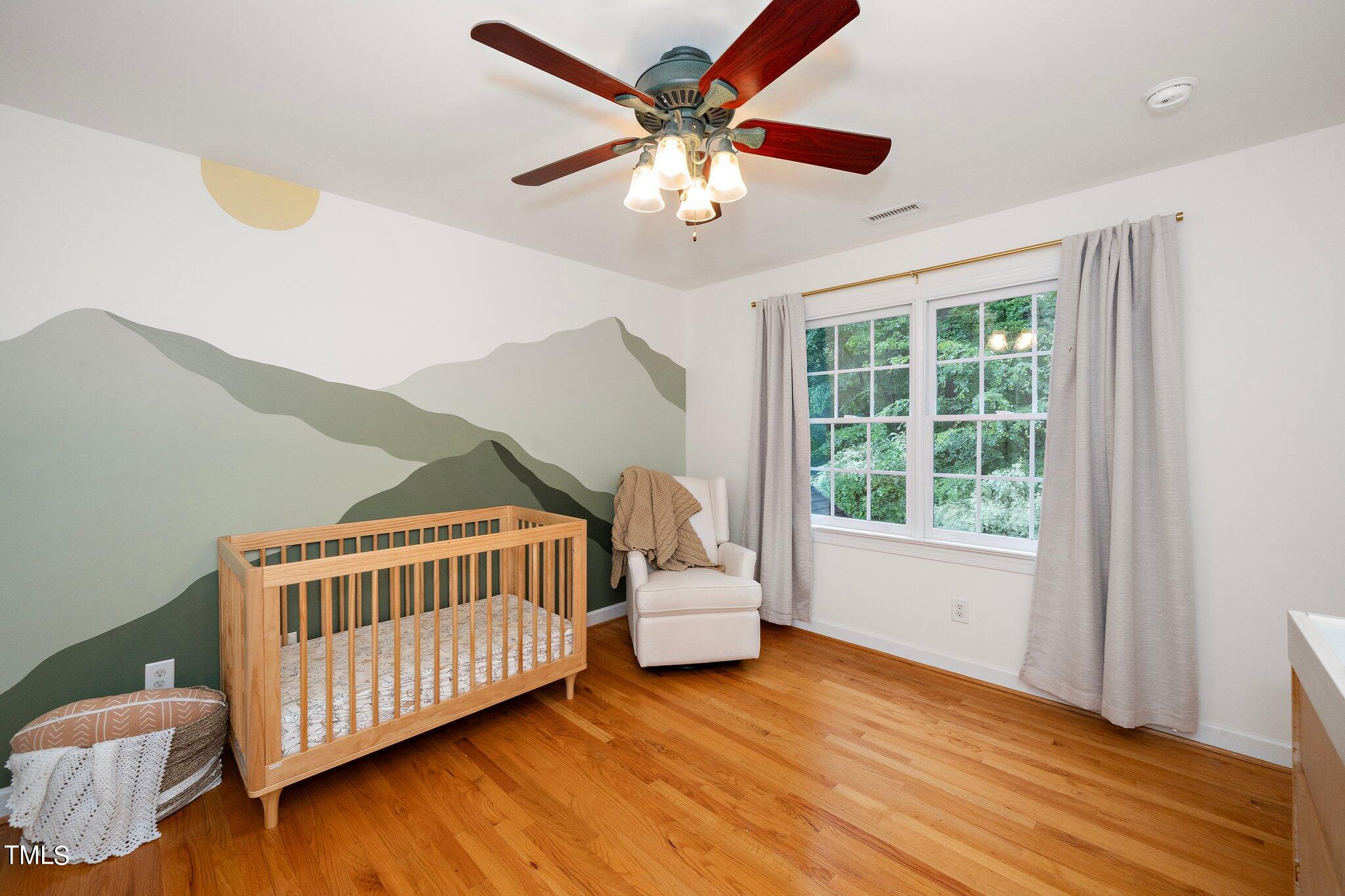 4427 Spring Meadows Road Hillsborough, NC 27278 - Photo 21 of 42 a bedroom with furniture and window