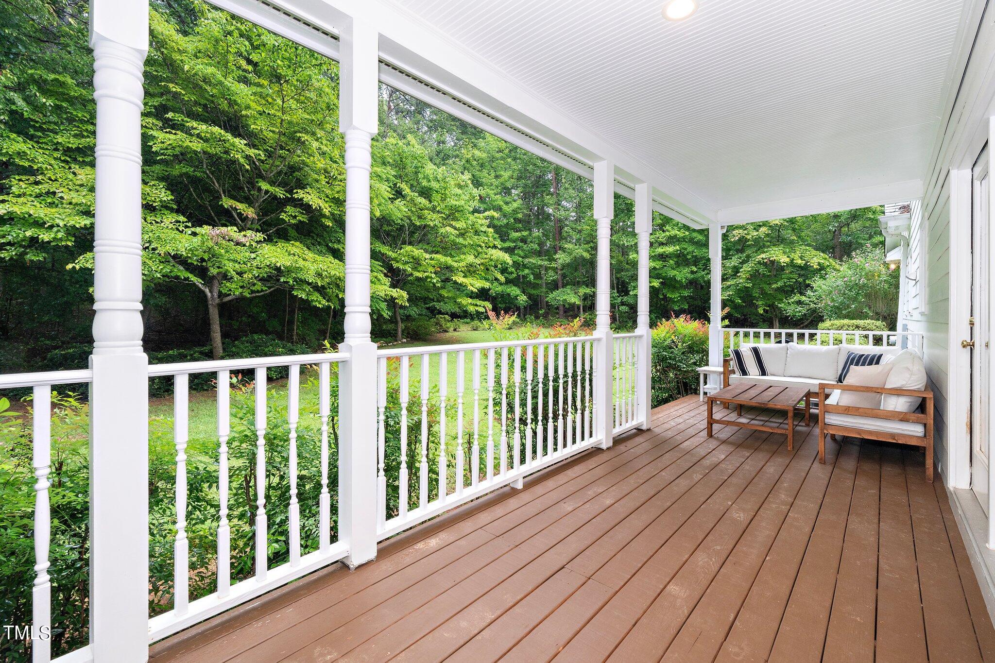 4427 Spring Meadows Road Hillsborough, NC 27278 - Photo 29 of 42 a view of a chairs and table on wooden deck