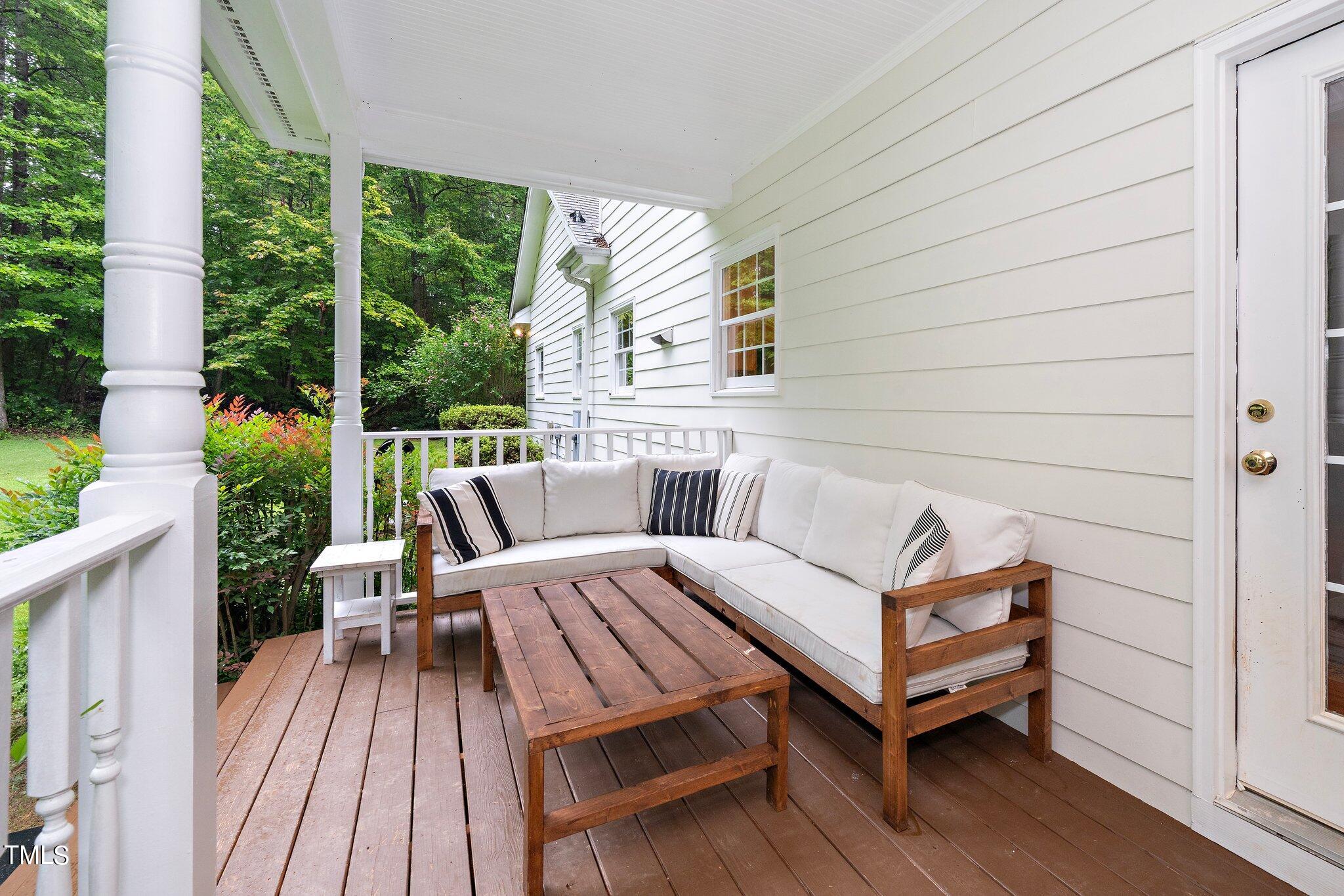 4427 Spring Meadows Road Hillsborough, NC 27278 - Photo 30 of 42 a view of a patio with wooden floor