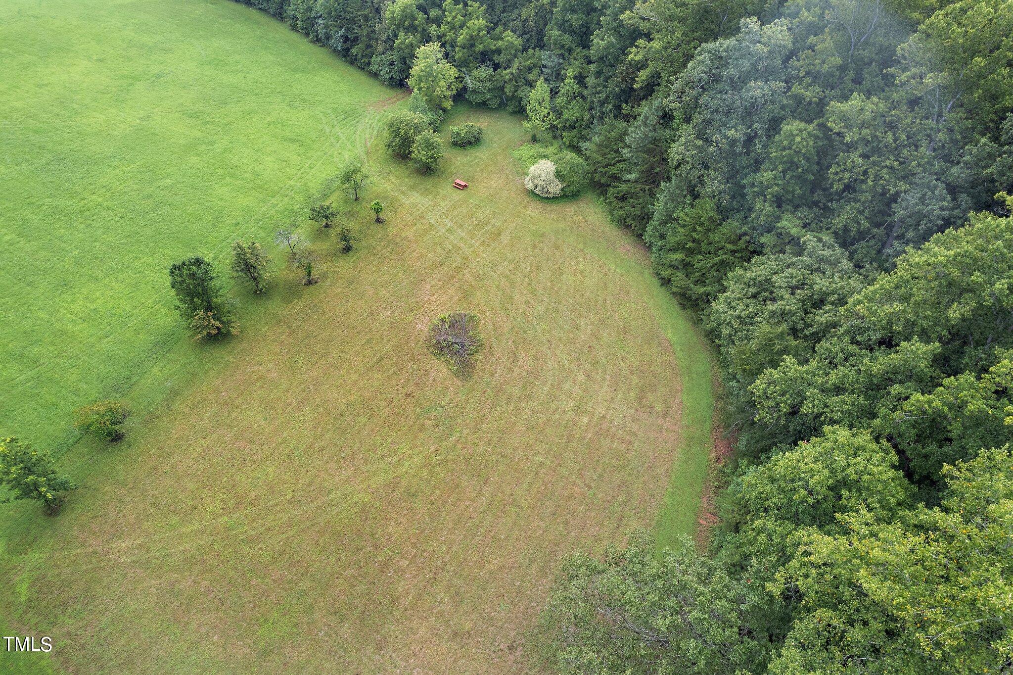 4427 Spring Meadows Road Hillsborough, NC 27278 - Photo 41 of 42 a bathroom with a small yard