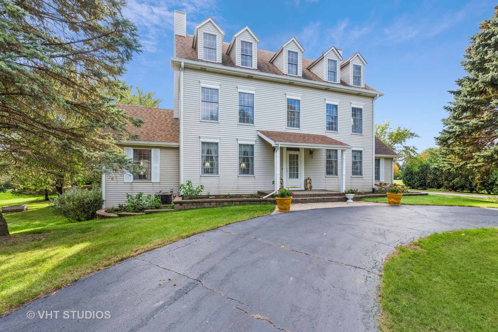 1N200 Denali Road Elburn, IL 60119 - Photo 1 of 23 a view of a house with a yard and plants