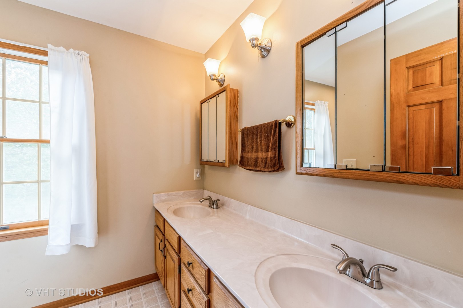 1N200 Denali Road Elburn, IL 60119 - Photo 13 of 23 a bathroom with a sink and a mirror