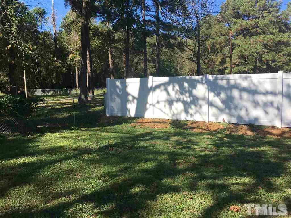 556 Dacian Road Raleigh, NC 27610 - Photo 18 of 20 a view of a yard with a tree