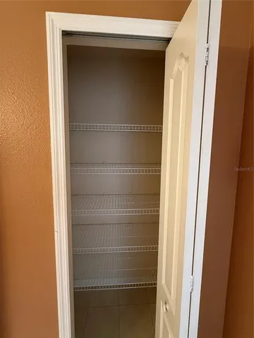 a bathroom with a glass door