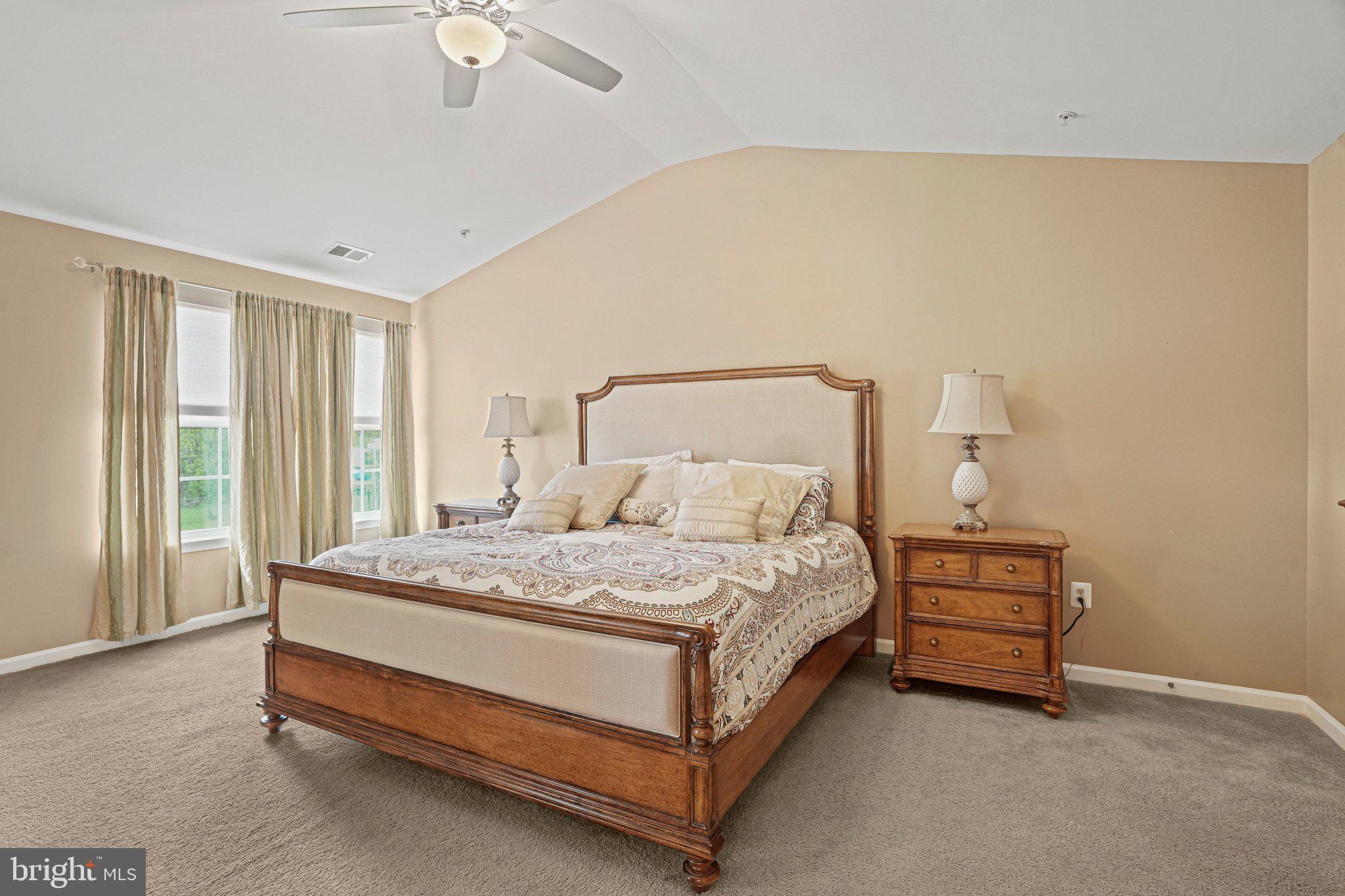 9309 Mount Vernon Way Fort Washington, MD 20744 - Photo 15 of 24 a bed sitting in a spacious bedroom next to a window