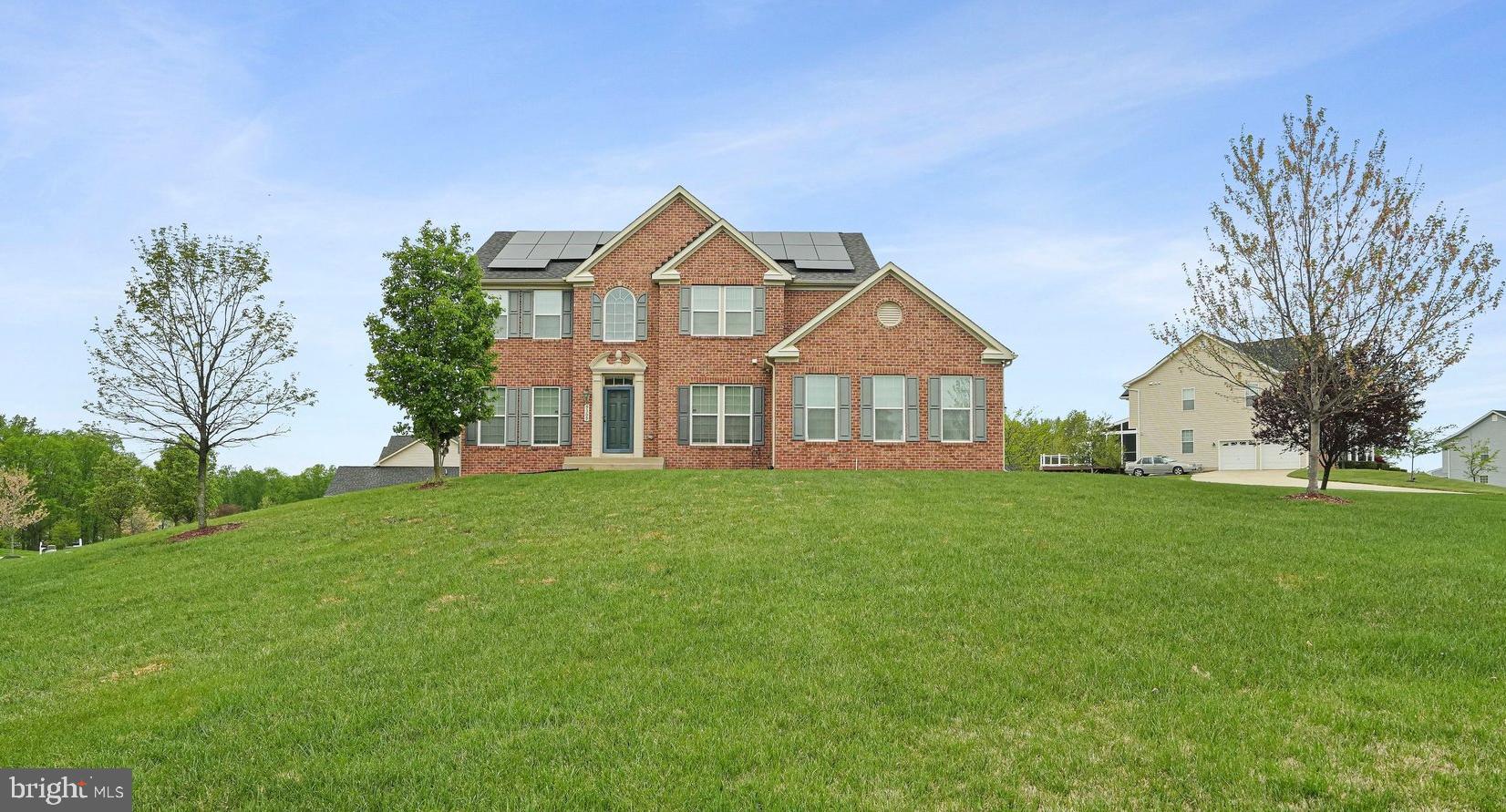 9309 Mount Vernon Way Fort Washington, MD 20744 - Photo 23 of 24 a front view of a house with a yard