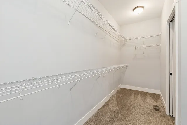 a view of a room with racks on the wall