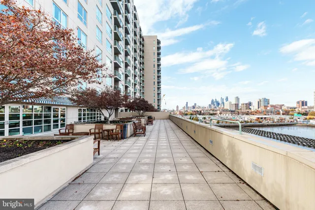 a view of a terrace with sitting area