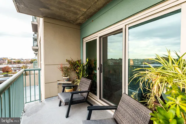 a building outdoor space with patio furniture