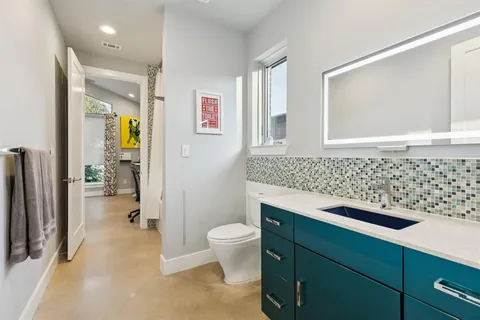 a bathroom with a sink and a toilet