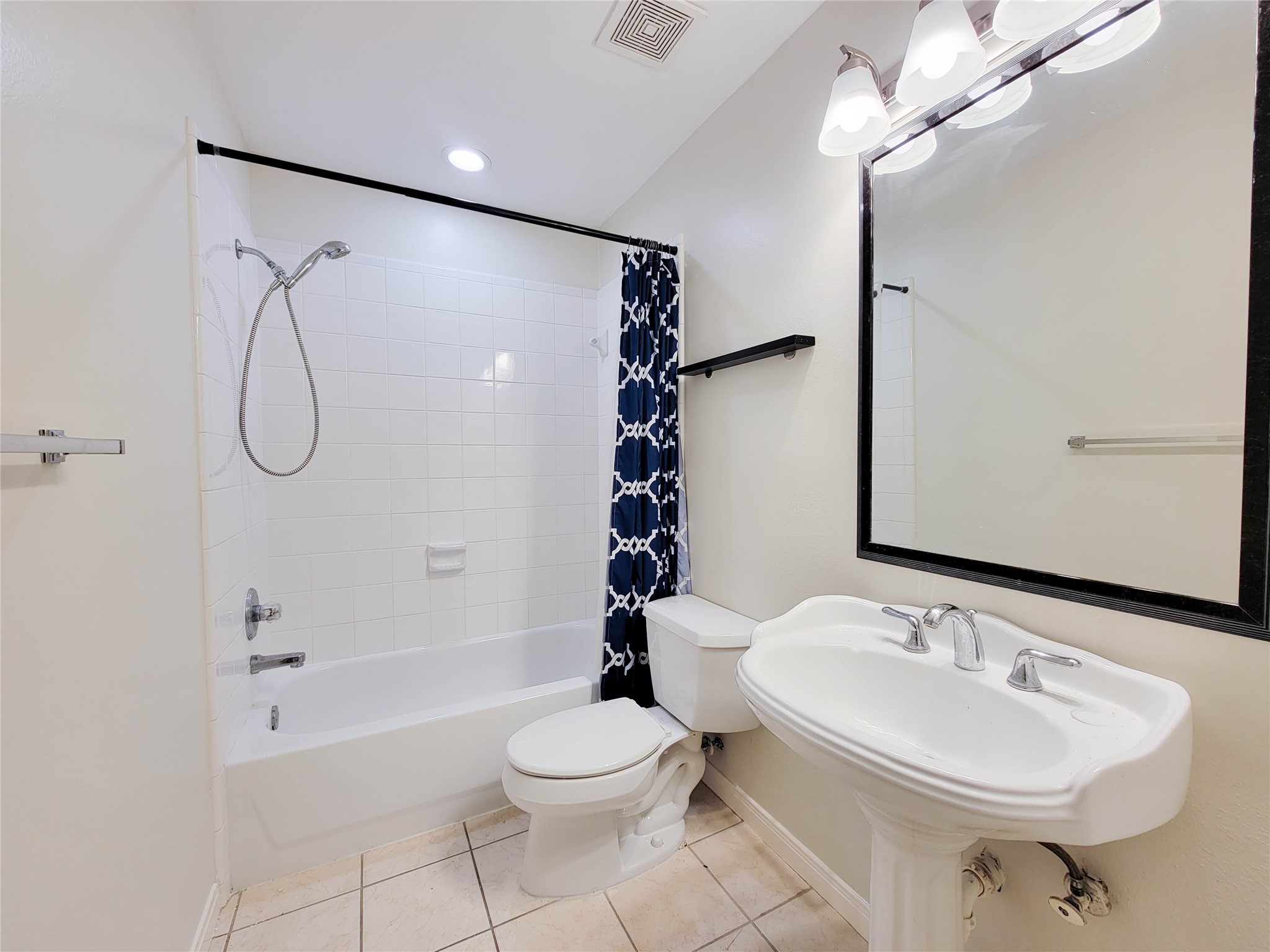 3010 La Branch Street Houston, TX 77004 - Photo 6 of 43 a bathroom with a sink toilet and shower