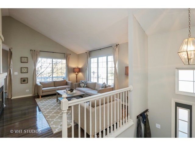 600 South Rosehall Lane Round Lake, IL 60073 - Photo 2 of 16 a living room with furniture and a window