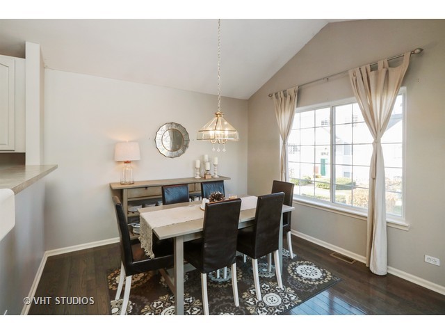 600 South Rosehall Lane Round Lake, IL 60073 - Photo 5 of 16 a view of a dining room with furniture and window
