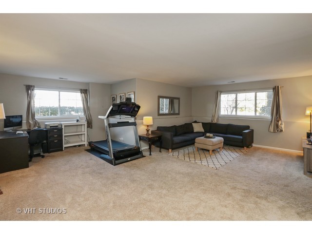 600 South Rosehall Lane Round Lake, IL 60073 - Photo 8 of 16 a living room with furniture and a window