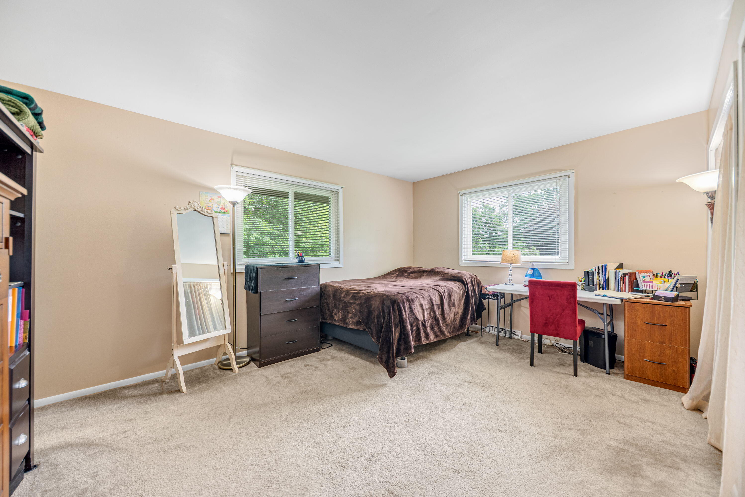 2337 Four Seasons Parkway Crown Point, IN 46307 - Photo 6 of 18 a bedroom with a bed and a large window