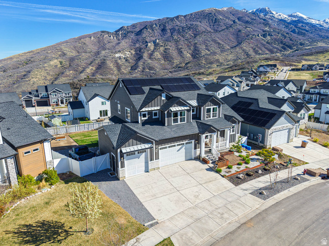 2487 Canyon Wild Road, Unit 413 Draper, UT 84020 - Photo 9 of 75 Aerial view of community with a mountain backdrop