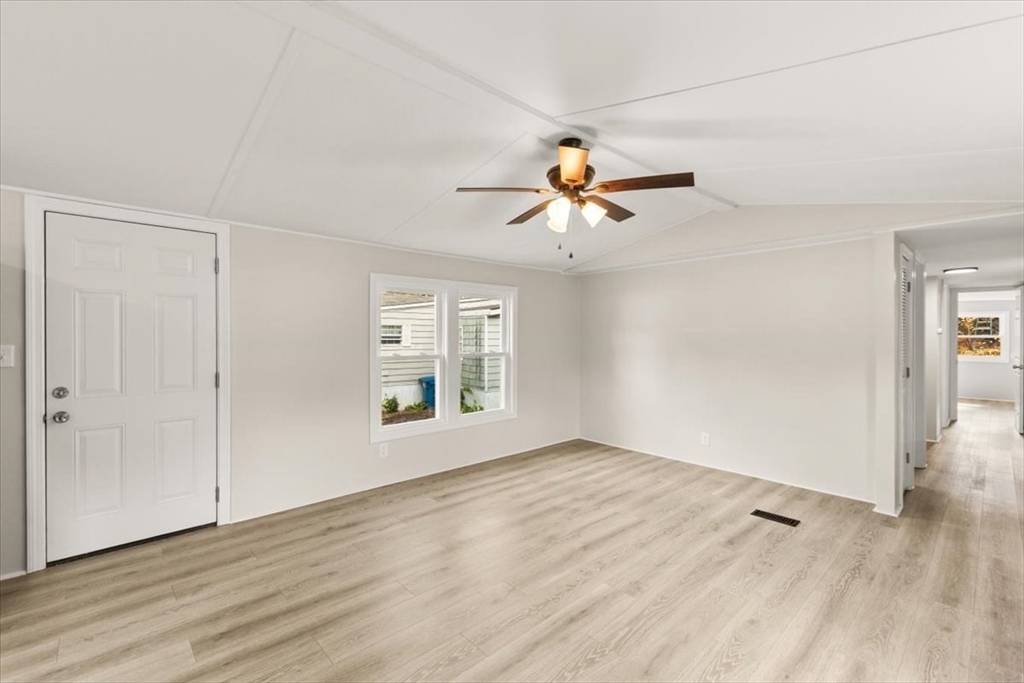 5 Marks Way Carver, MA 02330 - Photo 12 of 23 wooden floor in an empty room with a window