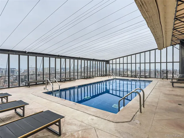 a view of balcony with furniture