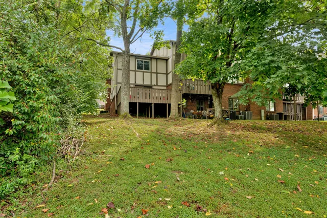 a house with trees in the background