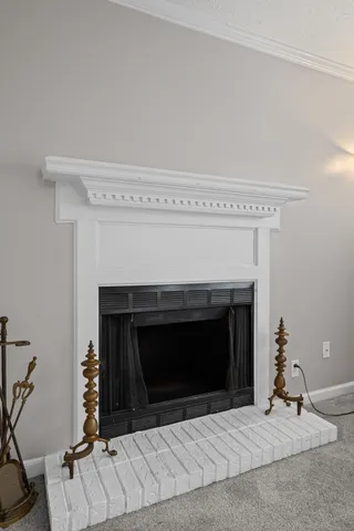 a living room with a fireplace