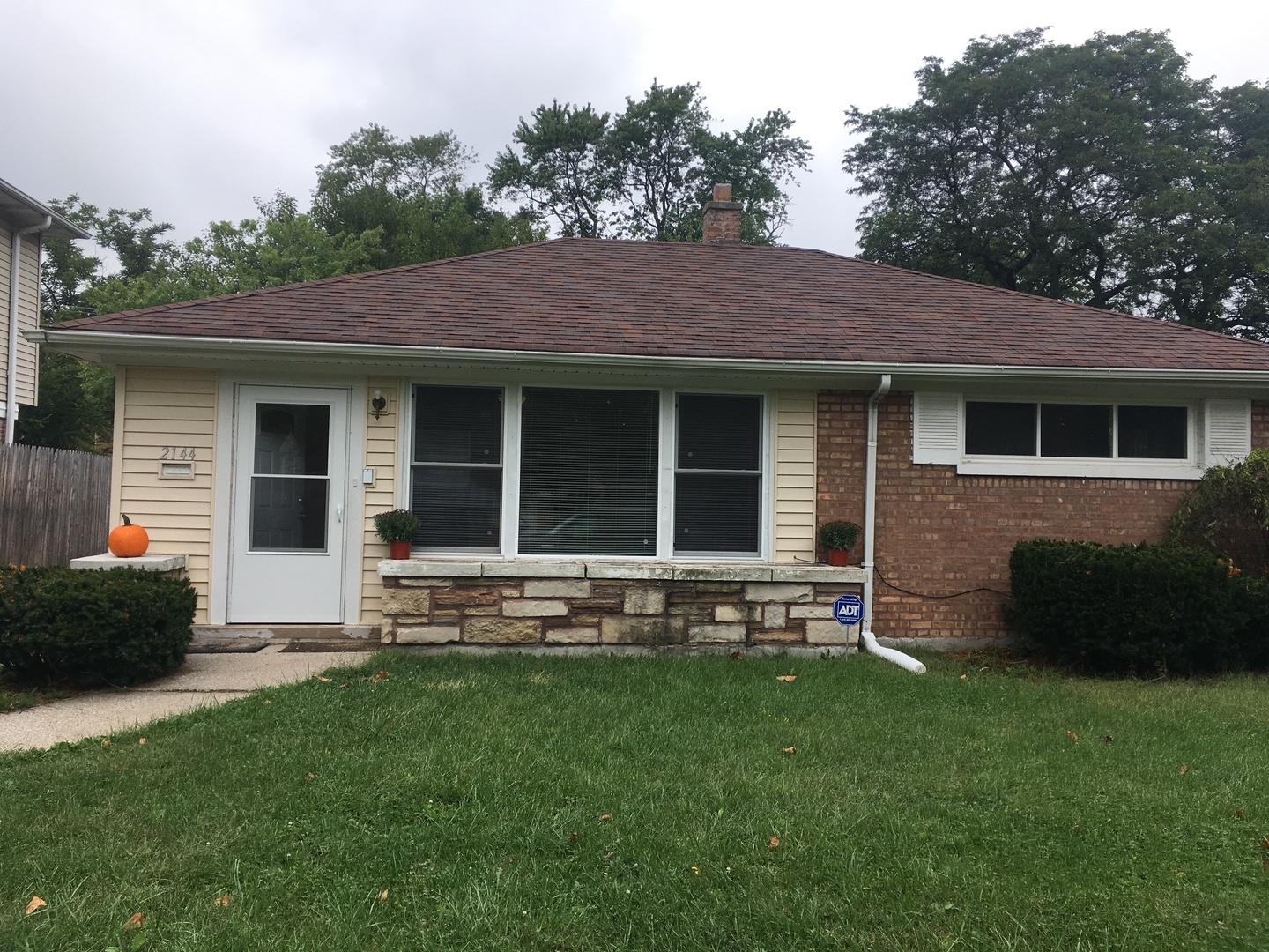 2144 Spruce Road Homewood, IL 60430 - Photo 1 of 13 a house view with a garden space