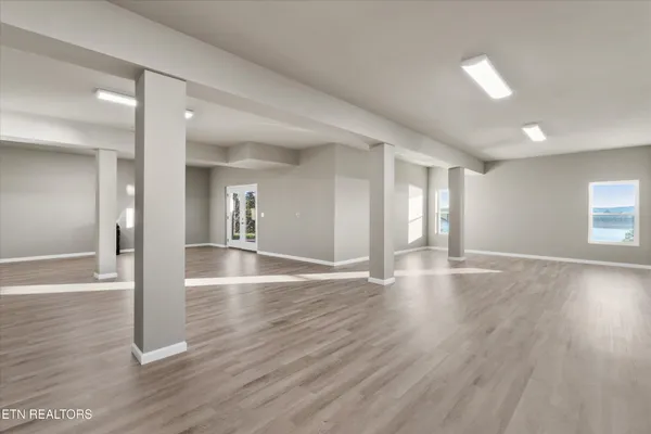 a view of a livingroom with wooden floor