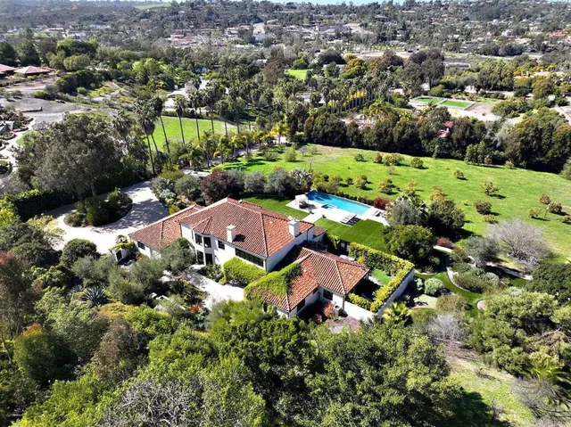 an aerial view of residential house with outdoor space