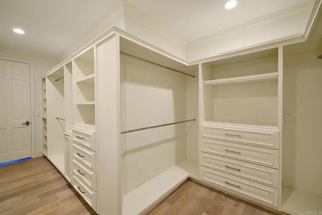 a view of a hallway with closet