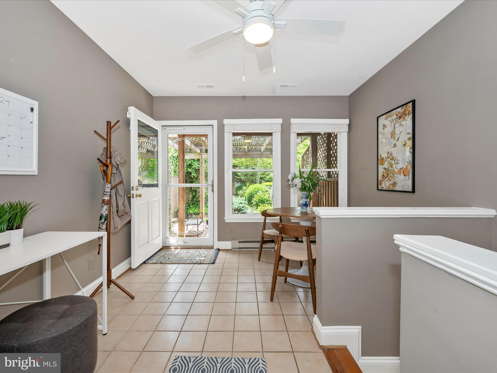 112 West 3rd Street Frederick, MD 21701 - Photo 19 of 62 Sunroom opens to patio and lush garden