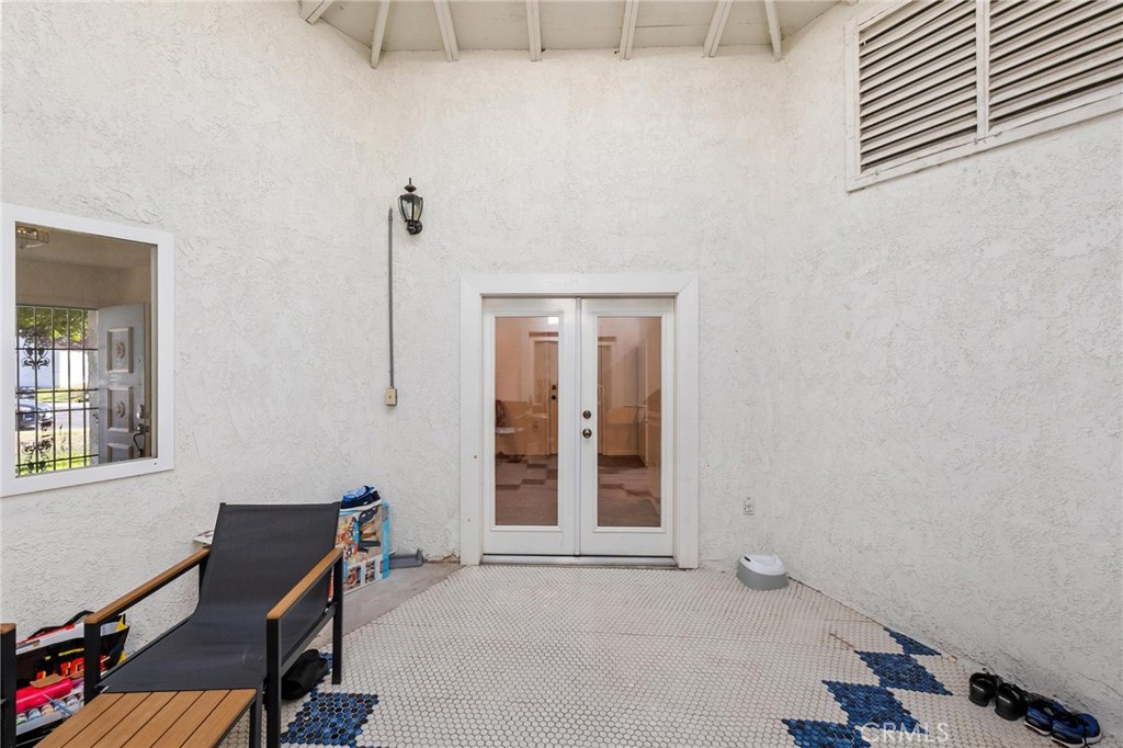 1076 Occidental Circle Redlands, CA 92374 - Photo 19 of 28 an empty room with windows and closet