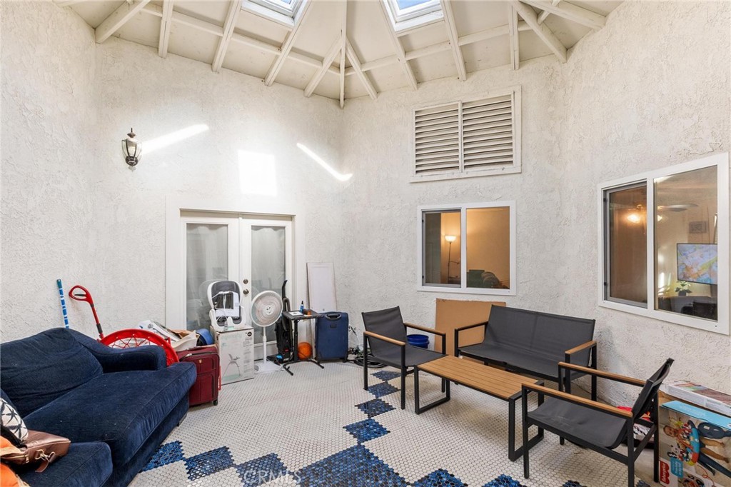 1076 Occidental Circle Redlands, CA 92374 - Photo 20 of 28 a living room with furniture and a window