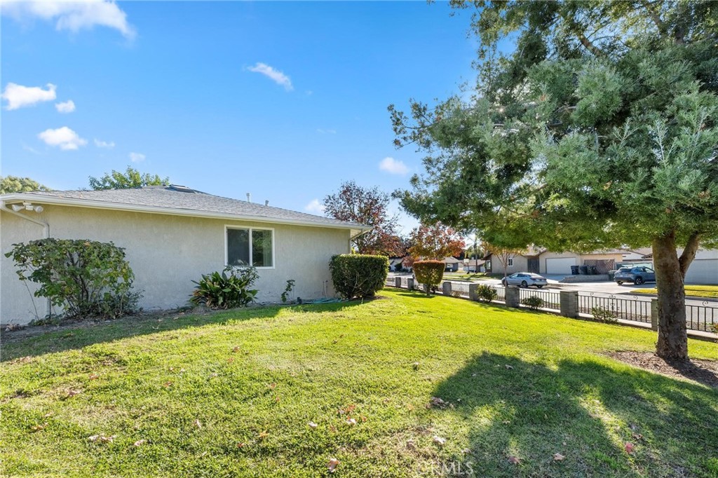 1076 Occidental Circle Redlands, CA 92374 - Photo 27 of 28 a view of a house with swimming pool and sitting area