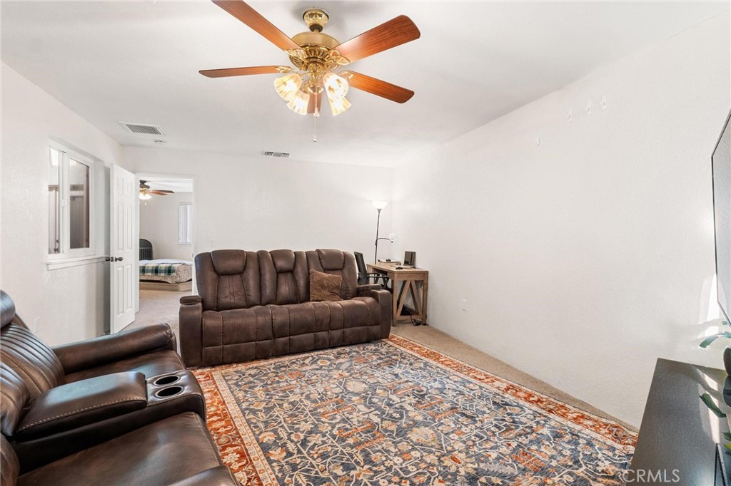 1076 Occidental Circle Redlands, CA 92374 - Photo 8 of 28 a living room with a couch