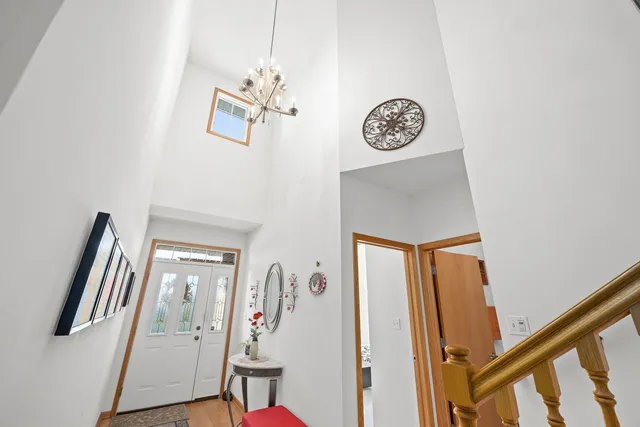 a view of entryway with stairs and wooden floor