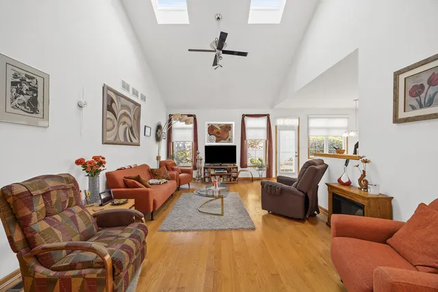 a living room with furniture or couch and a fireplace