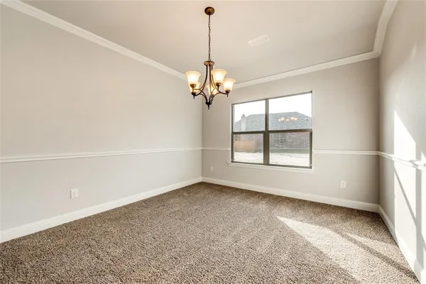 a view of a room with a large window
